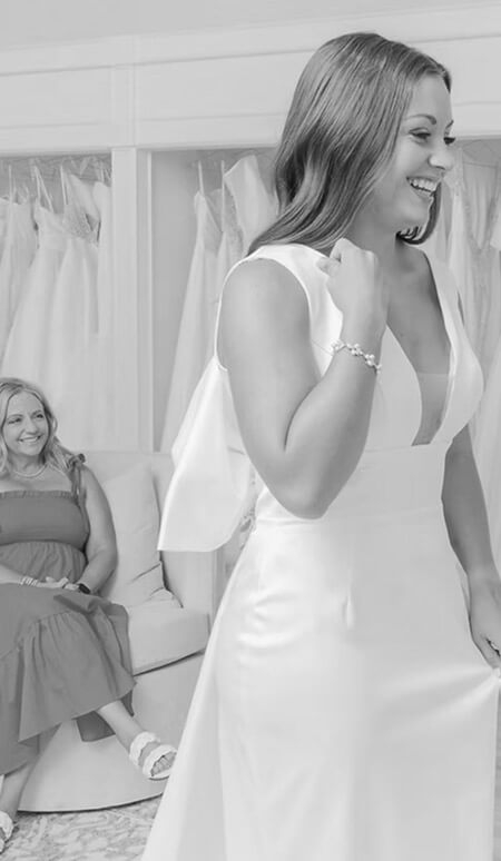 Model wearing a white dress